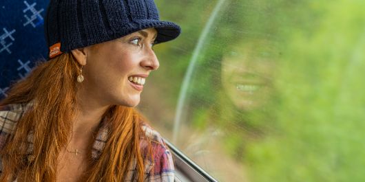 A women looking out a train window