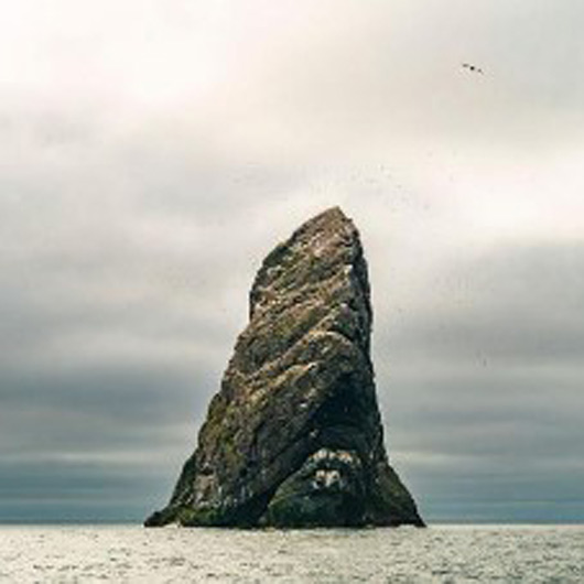 Sea stack in middle of sea